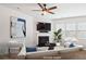 Inviting living room featuring a cozy fireplace and modern decor at 15119 Oleander Dr, Charlotte, NC 28278