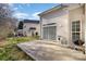 Wide backyard with patio, offering room for grilling, relaxing, and other activities at 1751 Holliford Ct, Charlotte, NC 28215