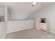 Bright bonus room with carpet and large closet at 1751 Holliford Ct, Charlotte, NC 28215