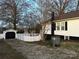 Backyard features a white fence and a garage at 201 Allen St, Kannapolis, NC 28083