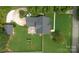 Aerial view showing roof, backyard, driveway, and surrounding greenery of property at 204 Julia Ave, Belmont, NC 28012