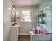 Updated bathroom featuring hexagon tile and glass shower at 204 Julia Ave, Belmont, NC 28012