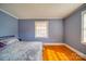 Bedroom with hardwood floors, neutral paint and ample natural light at 204 Julia Ave, Belmont, NC 28012