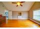Bright bedroom with hardwood floors, a window, and a convenient door at 204 Julia Ave, Belmont, NC 28012