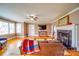 Spacious living room with hardwood floors, a cozy fireplace, and modern amenities, perfect for comfortable living and entertaining at 204 Julia Ave, Belmont, NC 28012
