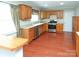 Well-appointed kitchen featuring stainless steel appliances, ample counter space, and light wood cabinets at 2046 Cartier Way, Charlotte, NC 28208