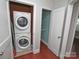 Conveniently located laundry area with stacked washer and dryer hookups, maximizing space at 2046 Cartier Way, Charlotte, NC 28208