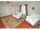 Living room with hardwood floors, a ceiling fan, and natural light at 2046 Cartier Way, Charlotte, NC 28208