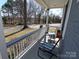 Charming porch featuring a cozy seating area with view of the neighborhood at 2046 Cartier Way, Charlotte, NC 28208