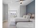 Inviting bedroom featuring neutral walls, two beds, and bright natural light at 206 Freeland Ln, Charlotte, NC 28217