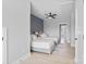 Bright bedroom with two twin beds, neutral decor and a ceiling fan creates a relaxing atmosphere at 206 Freeland Ln, Charlotte, NC 28217