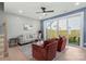 Inviting living room with a sliding door to the backyard, featuring neutral colors and stylish furniture at 210 Freeland Ln, Charlotte, NC 28217