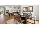 An elegant dining area with stylish furniture and decor adjacent to the kitchen, ideal for entertaining guests at 2227 Indigo Branch Rd, Indian Land, SC 29707