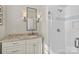 Bathroom featuring granite countertop and tiled stand-up shower at 2251 Selwyn Ave # 201, Charlotte, NC 28207