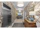 Stylish hallway with patterned wallpaper, modern lighting, and an elevator at 2251 Selwyn Ave # 201, Charlotte, NC 28207