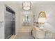 Elegant hallway features patterned wallpaper, modern lighting, and elevator access at 2251 Selwyn Ave # 201, Charlotte, NC 28207