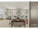 Bright living room with fireplace and french doors, featuring tasteful decor at 2251 Selwyn Ave # 201, Charlotte, NC 28207