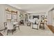 Spacious living area with fireplace, built-in shelving, and access to the balcony at 2251 Selwyn Ave # 201, Charlotte, NC 28207