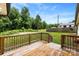 Inviting wooden deck overlooking a backyard with trees at 228 Tot Dellinger Rd, Cherryville, NC 28021