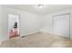 Bedroom featuring a closet and a doorway that leads to another room at 228 Tot Dellinger Rd, Cherryville, NC 28021