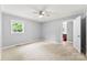 Spacious bedroom featuring neutral paint, plush carpet, and a ceiling fan at 228 Tot Dellinger Rd, Cherryville, NC 28021