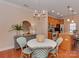 Cozy dining area featuring stylish decor, pendant lighting, and easy access to the kitchen at 244 Hurston Cir, Charlotte, NC 28208