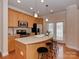 Well-equipped kitchen boasting stainless steel appliances, granite countertops, and convenient breakfast bar at 244 Hurston Cir, Charlotte, NC 28208