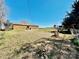 Large backyard perfect for outdoor activities, gardening, or simply enjoying nature, with a view of the home at 2604 Oxford Cir, Lancaster, SC 29720