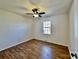 Bedroom with hardwood flooring, ceiling fan, and a sunny window at 2604 Oxford Cir, Lancaster, SC 29720