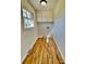 Laundry room with hardwood floors and natural light at 2604 Oxford Cir, Lancaster, SC 29720
