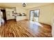 Open concept living room with hardwood floors and natural light at 2604 Oxford Cir, Lancaster, SC 29720