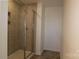Tiled stand-up shower with built in shelf space and glass door at 3511 Nimbell Rd, Monroe, NC 28110