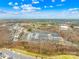An aerial view of a neighborhood showcasing a layout with green spaces and well-maintained landscaping at 3512 Auburn Curb Rd, Charlotte, NC 28217