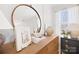 Bedroom featuring a stylish dresser with decorative mirror and curated decor at 3512 Auburn Curb Rd, Charlotte, NC 28217