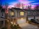 Charming two-story home with stone accents, a two-car garage, and a manicured lawn at 3512 Auburn Curb Rd, Charlotte, NC 28217