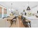 Bright, open kitchen with a large island, pendant lighting, and dining area at 3512 Auburn Curb Rd, Charlotte, NC 28217