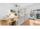 Bright living room featuring modern decor, hardwood floors, and a comfortable seating area with a view to the outside at 3512 Auburn Curb Rd, Charlotte, NC 28217