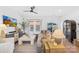 Spacious living room with modern furniture, natural light, and hardwood floors at 3512 Auburn Curb Rd, Charlotte, NC 28217
