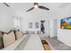 Comfortable main bedroom with a ceiling fan, TV, and walk-in closet at 3512 Auburn Curb Rd, Charlotte, NC 28217