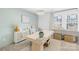 Bright home office with a modern chandelier, natural light, and stylish decor at 3512 Auburn Curb Rd, Charlotte, NC 28217