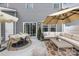 Outdoor patio featuring comfortable seating and dining areas with outdoor furniture at 3512 Auburn Curb Rd, Charlotte, NC 28217