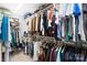 Spacious walk-in closet with ample hanging space and shelving for storage at 3512 Auburn Curb Rd, Charlotte, NC 28217