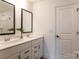 Modern bathroom featuring a double vanity with quartz countertops and black hardware at 3523 Rapport Ct # 026, Lancaster, SC 29720