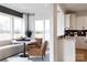 Bright breakfast nook with a marble table, comfortable seating, and natural light, adjacent to the modern kitchen at 3523 Rapport Ct # 026, Lancaster, SC 29720