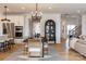 Open-concept dining area with modern lighting, stylish furniture, and seamless flow into the kitchen and living spaces at 3523 Rapport Ct # 026, Lancaster, SC 29720