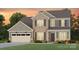 Charming two-story home with brick and siding, complemented by a well-manicured lawn and landscaping at 3523 Rapport Ct # 026, Lancaster, SC 29720