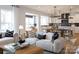 Bright and airy living room connected to kitchen, with stylish furniture, modern decor, and plenty of natural light at 3523 Rapport Ct # 026, Lancaster, SC 29720