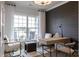 Sunlit home office with neutral palette, featuring a window view, desk, and comfortable seating at 3523 Rapport Ct # 026, Lancaster, SC 29720