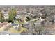 A high aerial shot of a house with mature trees and backyard at 4201 Winedale Ln, Charlotte, NC 28205