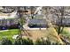 Aerial view of the home's fenced backyard with a patio, ready for outdoor enjoyment at 4201 Winedale Ln, Charlotte, NC 28205